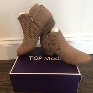 Tan perforated strap boho ankle booties